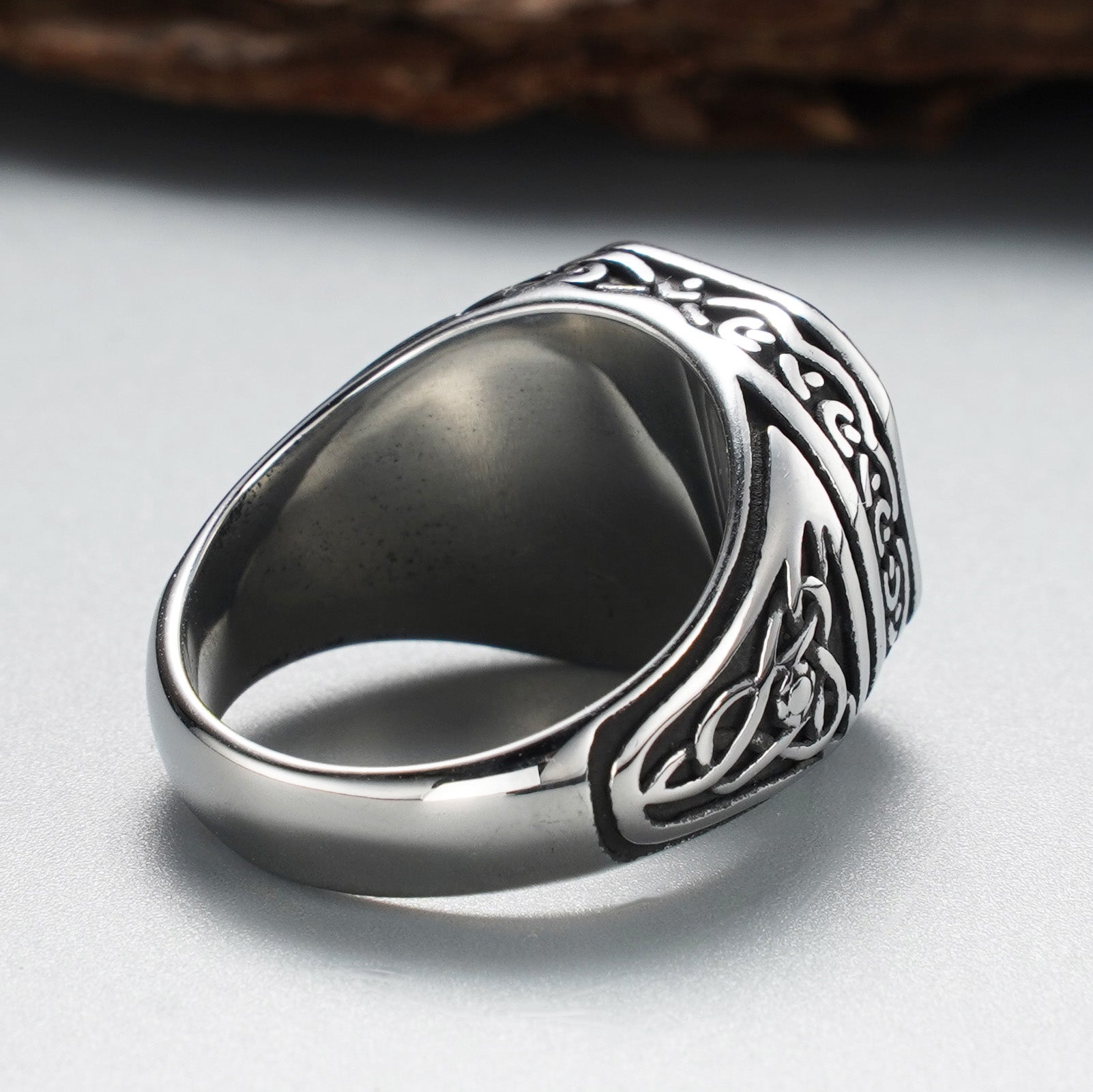 Men's stainless steel ring with blue synthetic lapis lazuli stone - side angle view