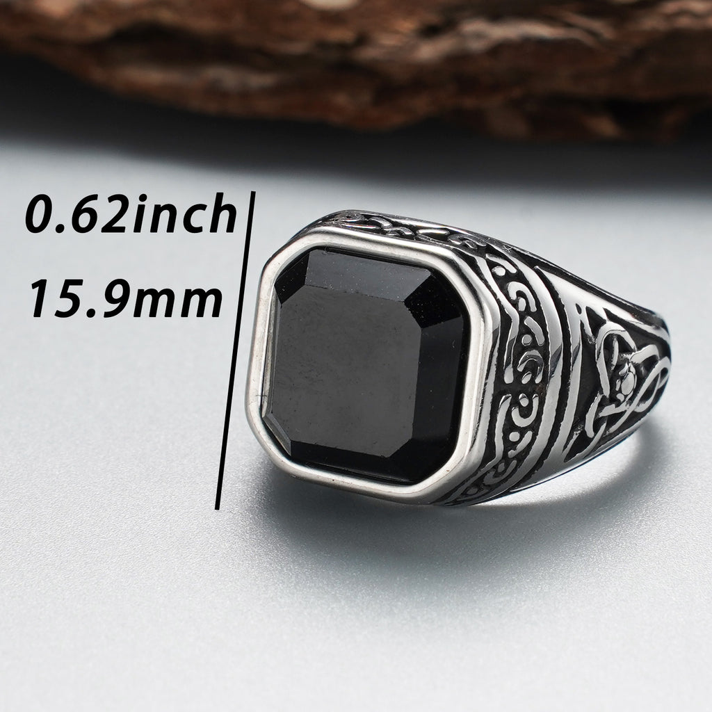Men's stainless steel ring with black synthetic stone - close-up front view