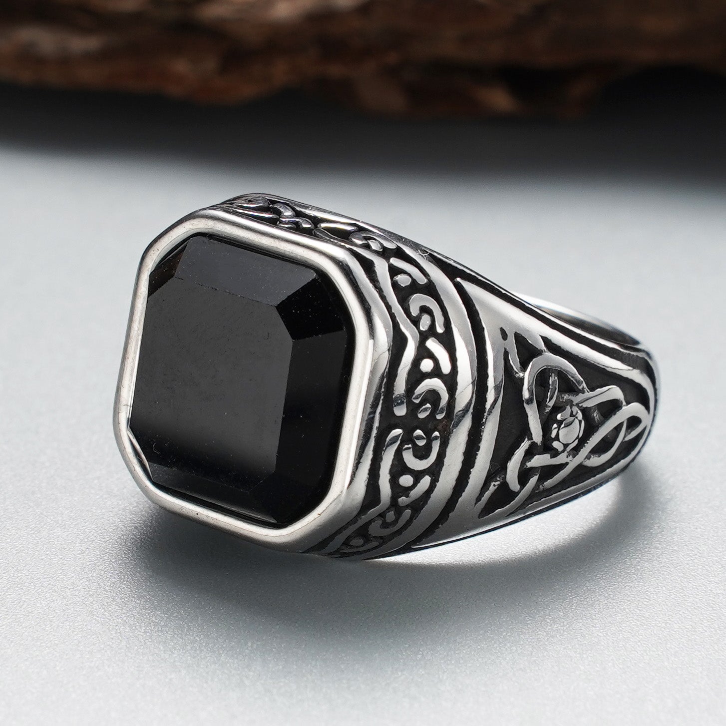 Men's stainless steel ring with black synthetic stone - lifestyle angle view